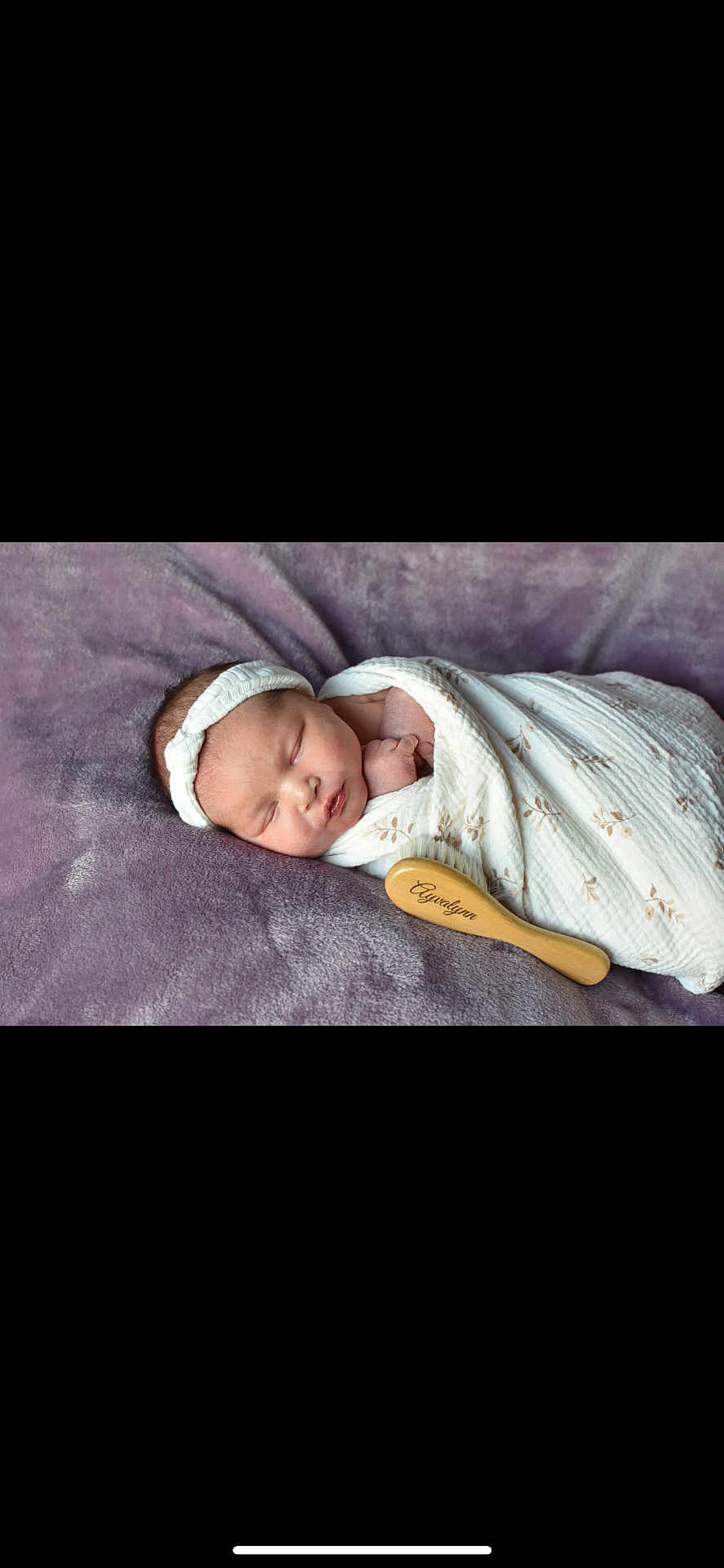 Ayvalynn joined the competition — help win amazing prizes! newborn, baby, sleeping, blanket, headband, wooden_brush, purple_blanket, infant, wrapped, soft_texture, peaceful, cute, portrait, resting, indoors, closeup, child, person, tender, cozy