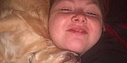 Bella is registered to the contest to win money with this photo: person, dog, golden_retriever, face, smile, snuggle, affection, closeup, indoor, cuddle, pet, animal, friendship, love, happy, relaxation, collar, fur, portrait, casual