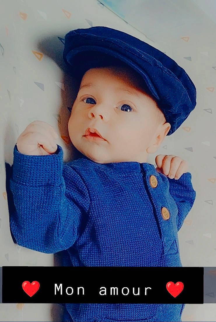 Mael participe au concours pour gagner de l'argent avec cette photo : azure, baby, baby_products, baby_toddler_clothing, beauty, cap, cheek, child, chin, cool, electric_blue, fashion_accessory, font, happy, headgear, headwear, pattern, person, product, skin