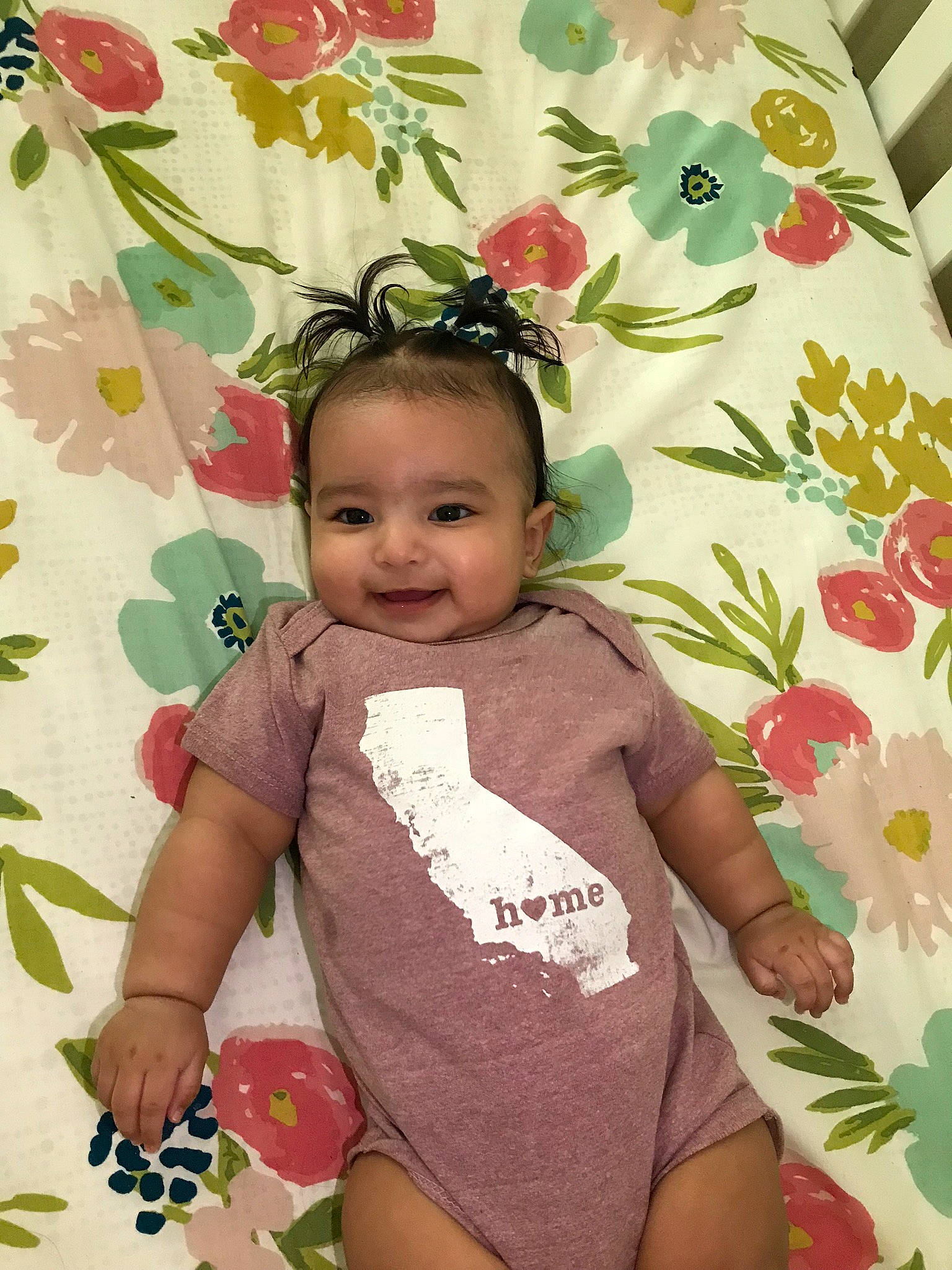 Aria joined the competition — help win amazing prizes! baby, baby_toddler_clothing, botany, child, flower, happy, iris, joy, magenta, pattern, people_in_nature, person, petal, pink, plant, skin, sleeve, smile, spring, t_shirt