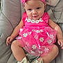 baby, child, closeup, comfortable, cushion, cute, fashion, flower_pattern, footwear, happy, headband, indoors, infant, person, pink_dress, portrait, sitting, smiling, toddler, white_bow