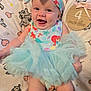 Juni joined the competition — help win amazing prizes! animal_print, baby, blanket, child, chubby_legs, colorful_clothing, cute, dress, four_months, happy, headband, indoor, infant, lying_down, milestone, pink_ribbon, portrait, smiling, tulle_skirt, wooden_plaque