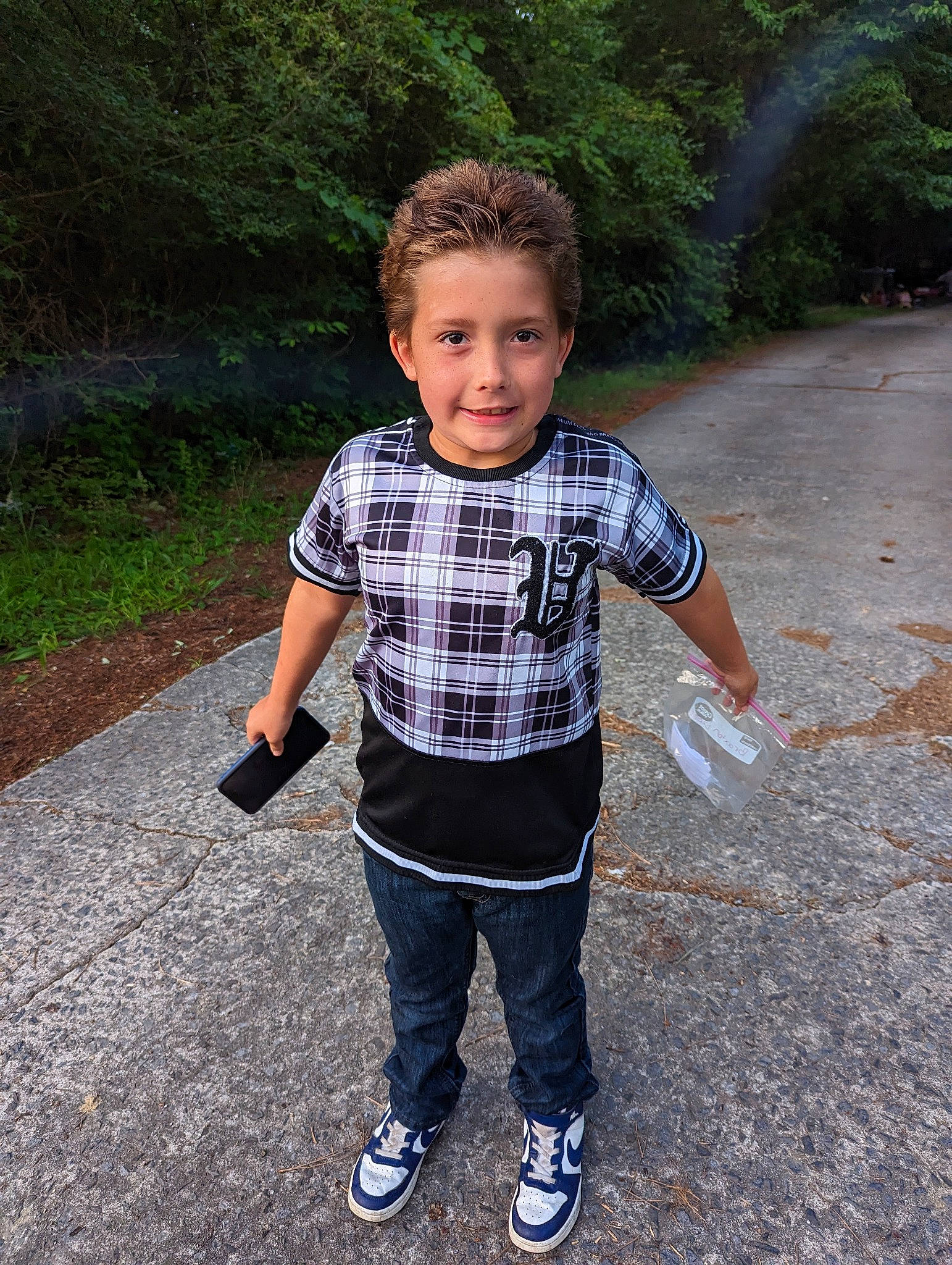 Braxton joined the competition — help win amazing prizes! asphalt, child, denim, electric_blue, face, fun, grass, happy, head, joy, leisure, pattern, people_in_nature, person, plaid, plant, recreation, sleeve, t_shirt, tartan