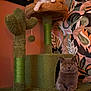 cat, cats, cat_tree, cactus, indoor, pet, feline, cute, curious, relaxed, animal, orange_eyes, gray_cat, kitten, decor, wallpaper, furniture, playful, resting, home