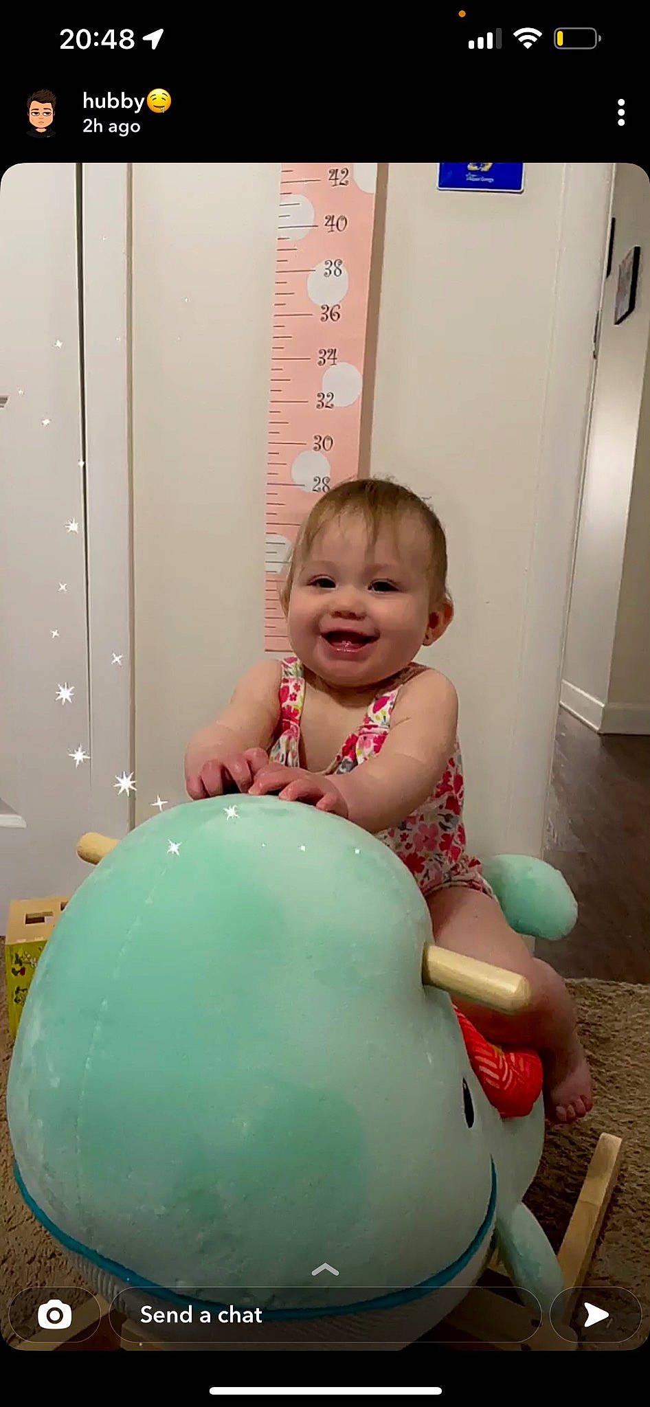 Kamila is registered to the contest to win money with this photo: art, baby, baby_toddler_clothing, balloon, child, door, flooring, foot, fun, happy, human_body, human_leg, joy, party_supply, person, pink, sitting, smile, thigh, toddler