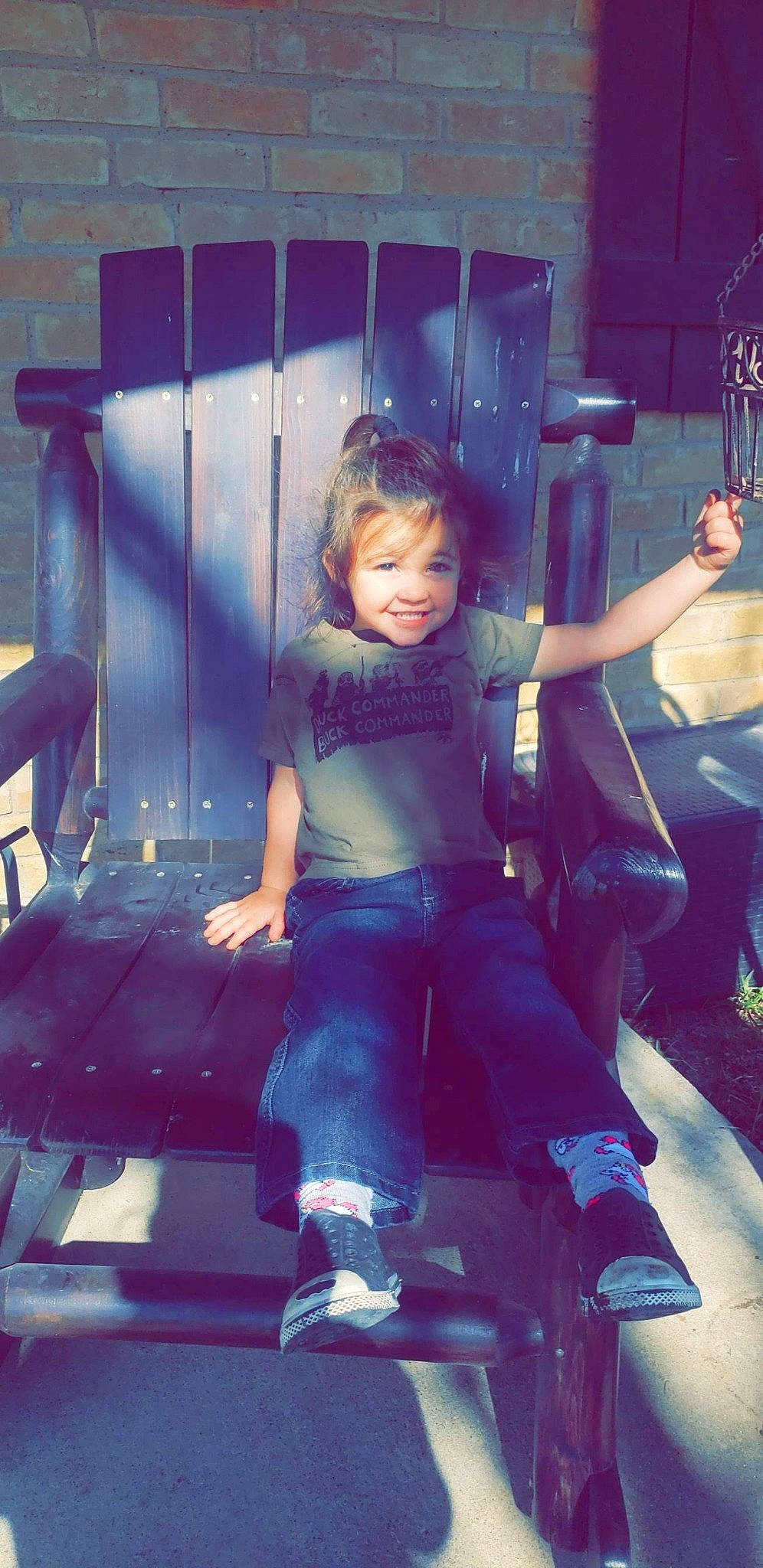 Andi is registered to the contest to win money with this photo: black_hair, joy, magenta, person, photography, sitting, smile