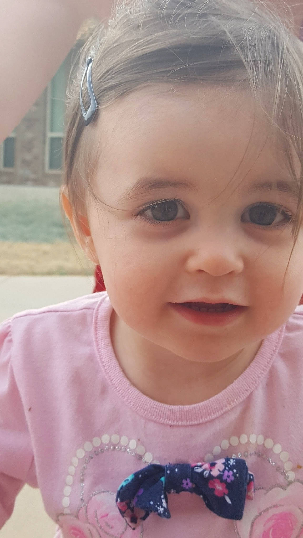 Ember is registered to the contest to win money with this photo: baby, beauty, cheek, child, chin, ear, eye, eyebrow, face, facial_expression, forehead, hair, hairstyle, head, lip, nose, person, pink, skin, smile