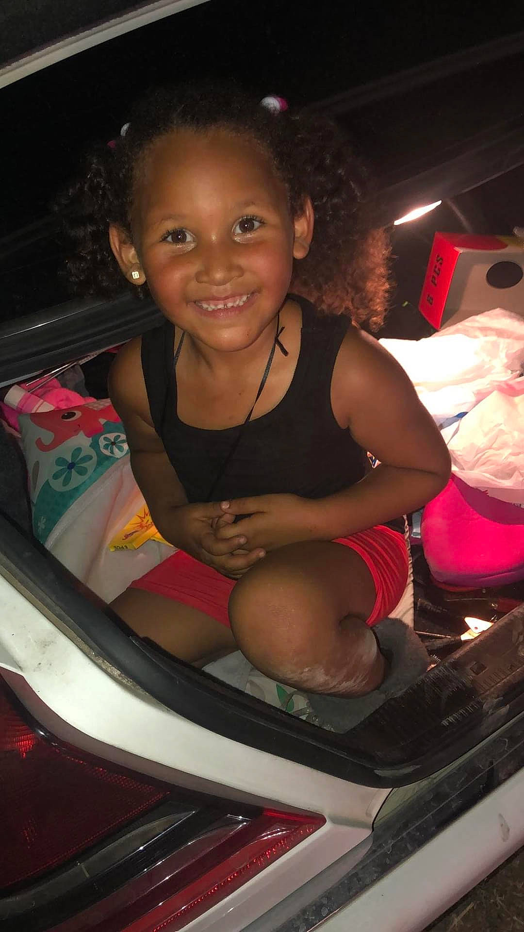 Mia is registered to the contest to win money with this photo: auto_part, bumper, child, joy, person, smile