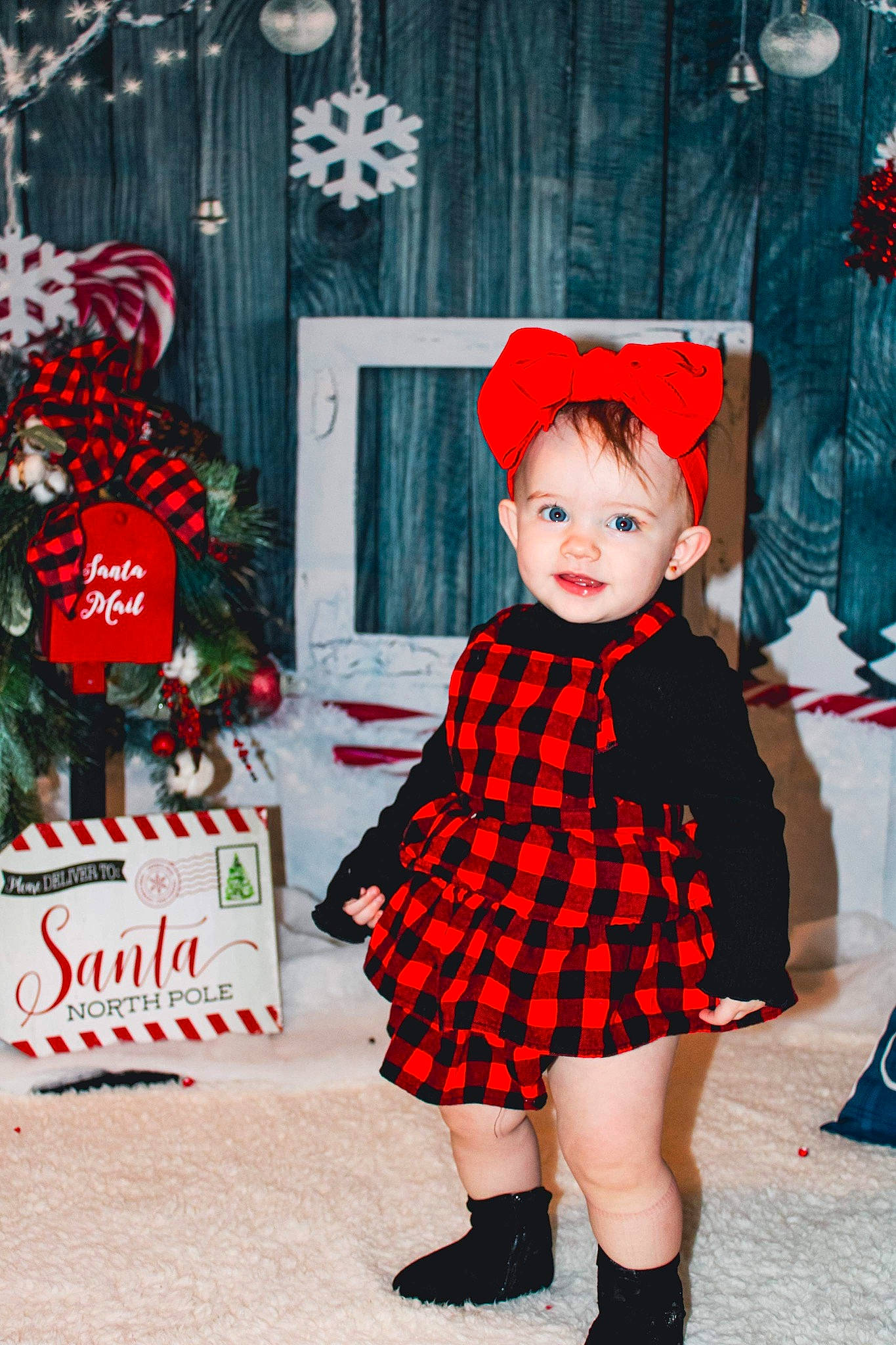 Everlea is registered to the contest to win money with this photo: baby_toddler_clothing, christmas_eve, costume_hat, curtain, day_dress, dress, event, fashion_design, formal_wear, hat, holiday, one_piece_garment, pattern, person, pink, plaid, red, sleeve, tartan, toddler