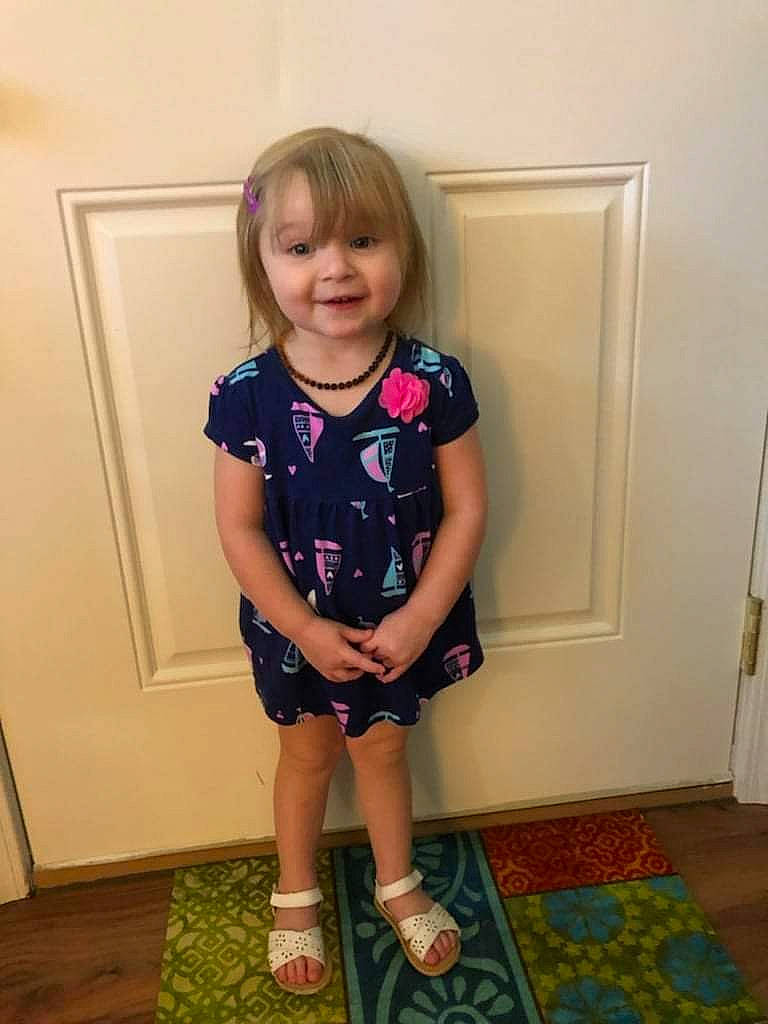 Hadleigh is registered to the contest to win money with this photo: arm, baby_toddler_clothing, electric_blue, face, flooring, footwear, happy, human_leg, joint, joy, knee, leg, neck, person, shorts, shoulder, sleeve, smile, standing, t_shirt