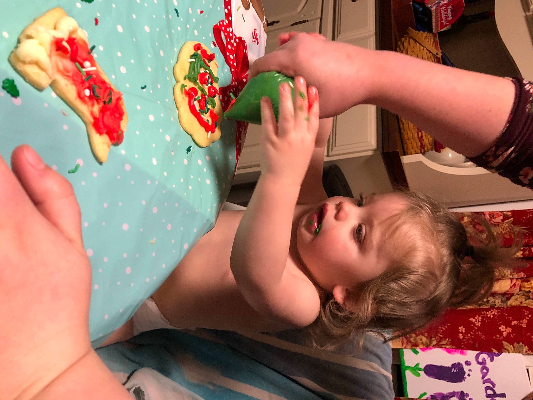 Van is registered to the contest to win money with this photo: baby, baby_toddler_clothing, baked_goods, bracelet, cake, dessert, finger, hand, human, icing, nail, person, plate, play, sweetness, thumb, toddler, wrist