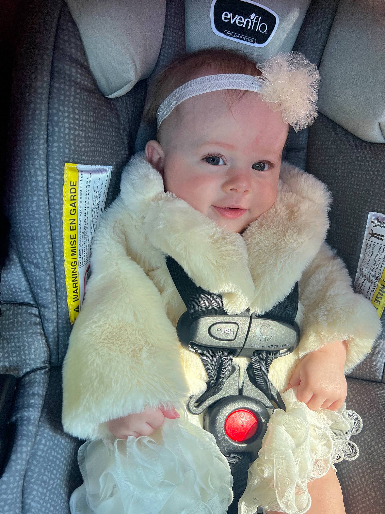 Josie Jane joined the competition — help win amazing prizes! auto_part, baby, baby_carriage, baby_products, baby_toddler_clothing, cap, car_seat, cheek, child, comfort, face, fashion_accessory, fur, fur_clothing, happy, hat, person, sitting, skin, toddler