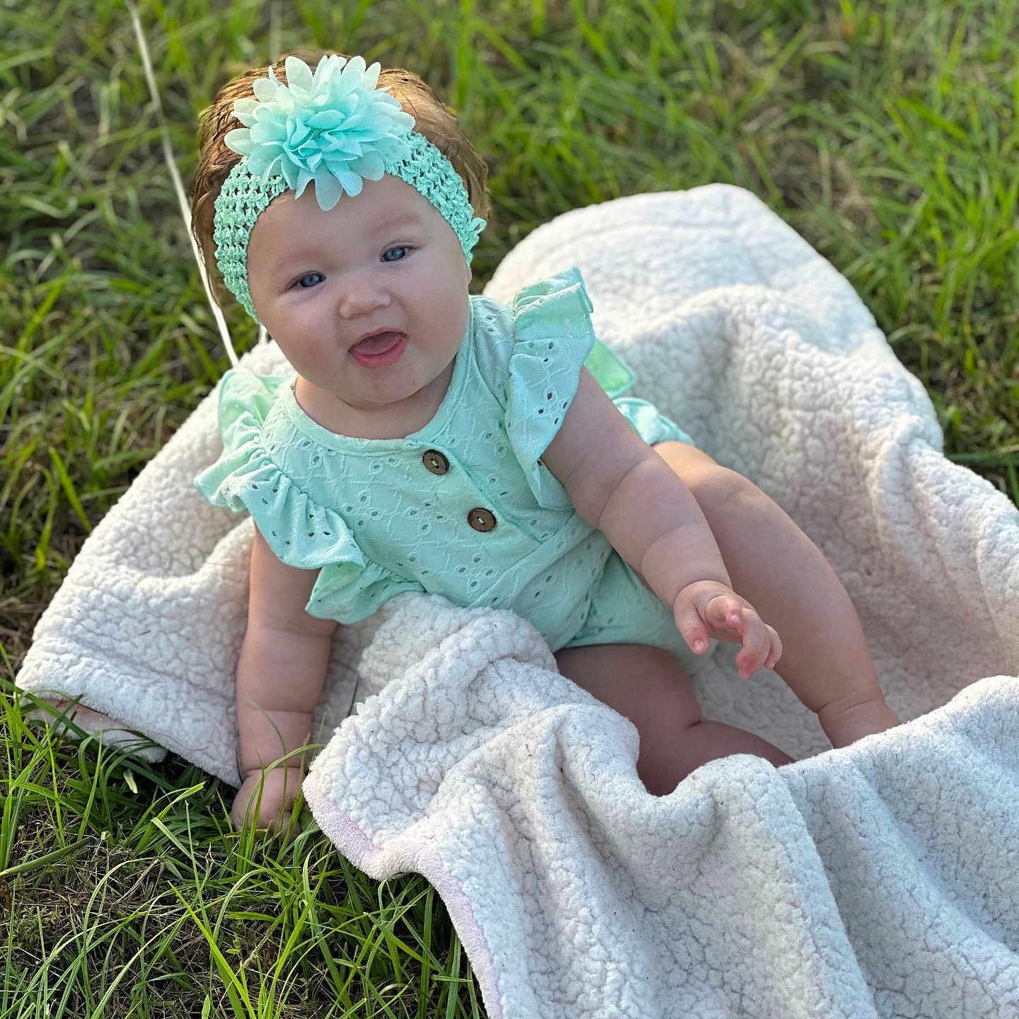 Adalynn Grace joined the competition — help win amazing prizes! baby, balloon, blanket, child, clothing, cute, flower, grass, greenery, happy, headband, infant, nature, outdoor, playful, portrait, sitting, smiling, soft_texture, sunlight