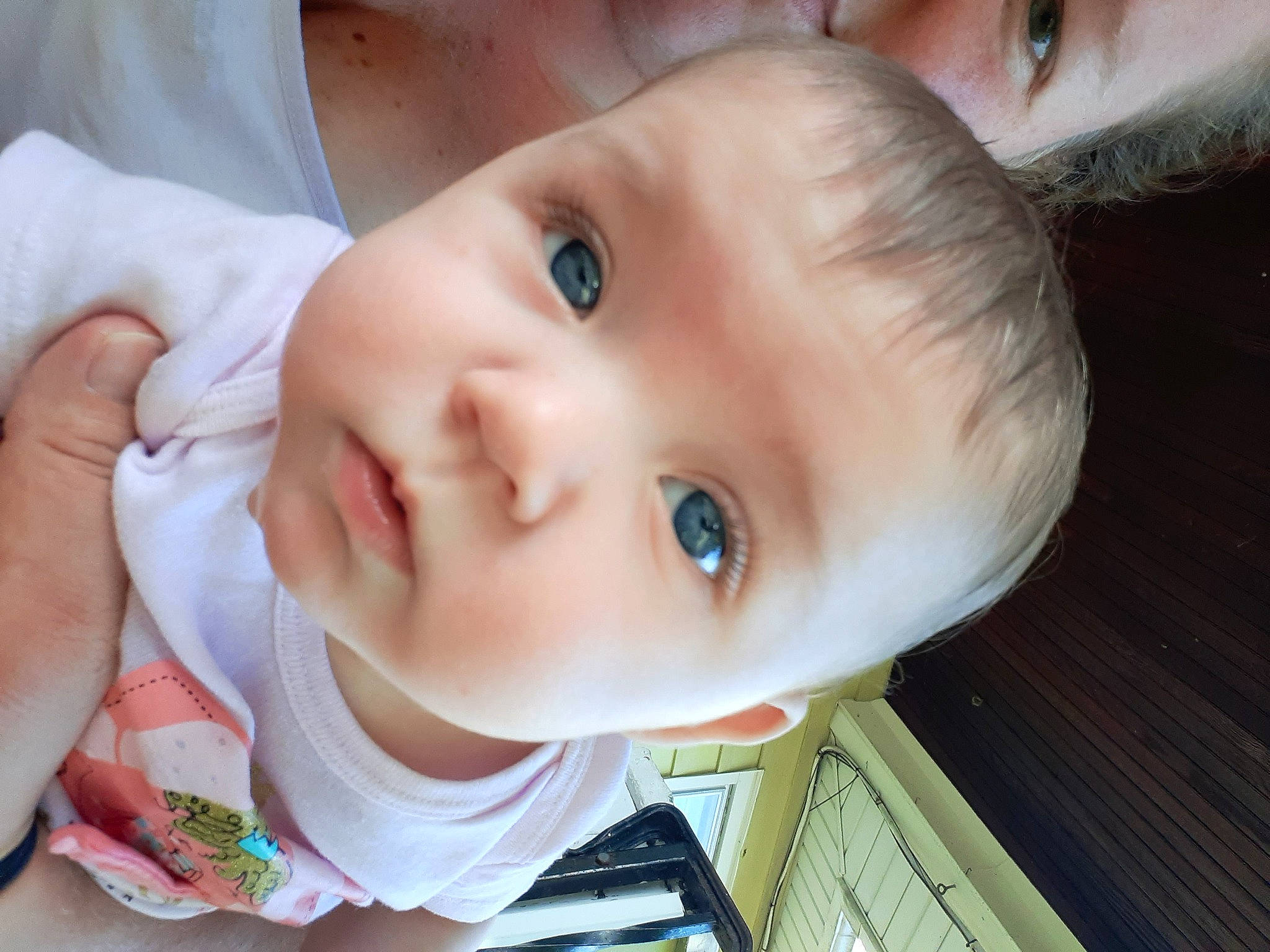 Laura is registered to the contest to win money with this photo: baby, baby_toddler_clothing, cheek, child, chin, close_up, ear, eyebrow, eyelash, facial_expression, fun, happy, iris, lip, mammal, mouth, nose, person, portrait_photography, skin