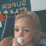 Savannah joined the competition — help win amazing prizes! toddler, baby, pacifier, blue_eyes, child, arm, indoor, couch, poster, resting, person, face, head, skin, hair, closeup, young_child, casual, expression, comfort