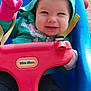 baby, child, swing, playground, outdoor, hoodie, mittens, smile, happy, toy, basketball, seatbelt, person, daylight, playtime, blue, red, pink, green, plastic