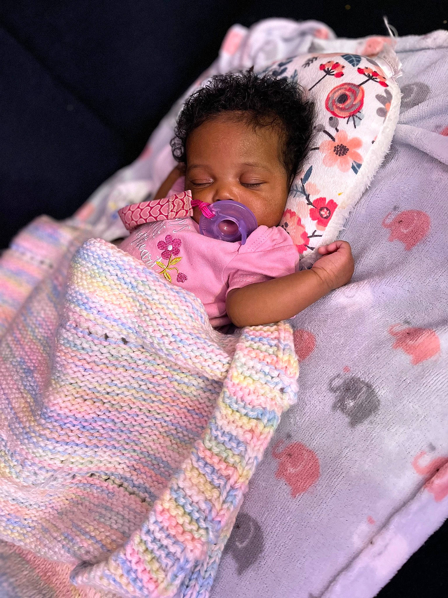 Ameiah is registered to the contest to win money with this photo: baby, baby_products, baby_sleeping, baby_toddler_clothing, bed, bedding, bedtime, carmine, child, comfort, linens, magenta, nap, pattern, person, pink, purple, room, sleeve, toddler