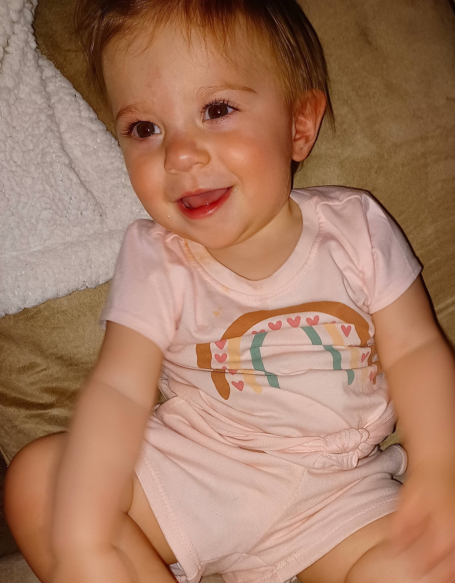 Natalie is registered to the contest to win money with this photo: baby, baby_toddler_clothing, cheek, chin, eye, eyelash, face, finger, hairstyle, head, human_body, iris, joy, lip, mouth, neck, nose, person, pink, skin