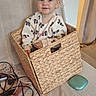 Victoria participe au concours pour gagner de l'argent avec cette photo : toddler, child, basket, couch, sweater, blonde_hair, blue_eyes, indoor, cozy, woven_basket, furniture, cords, small_case, curtain, smiling, sitting, person, home, casual, cute