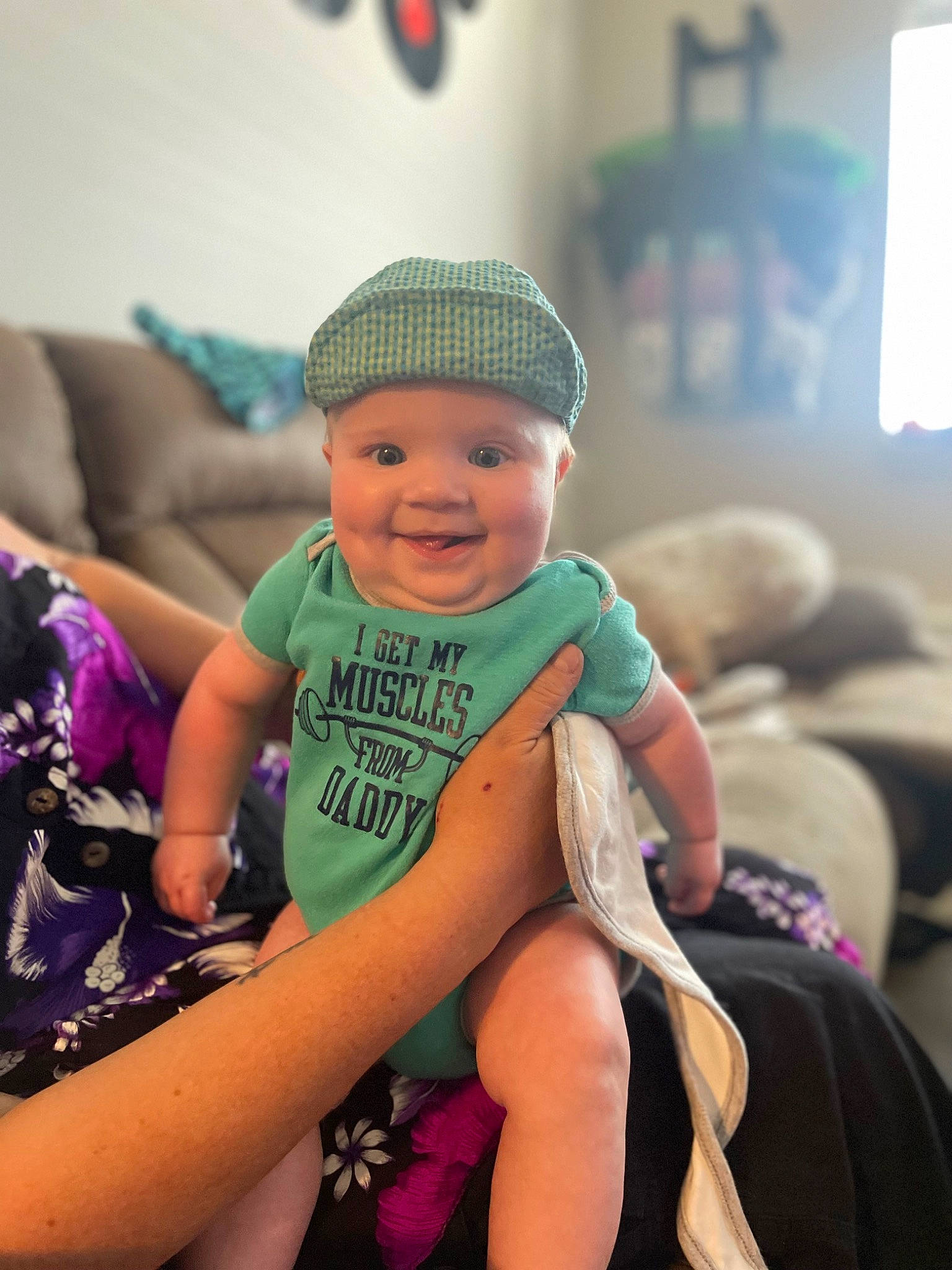 Beckham joined the competition — help win amazing prizes! baby, baby_toddler_clothing, baseball_cap, cap, child, cool, event, fashion_accessory, fun, happy, hat, headgear, headwear, human_leg, joy, lap, leisure, person, sitting, smile