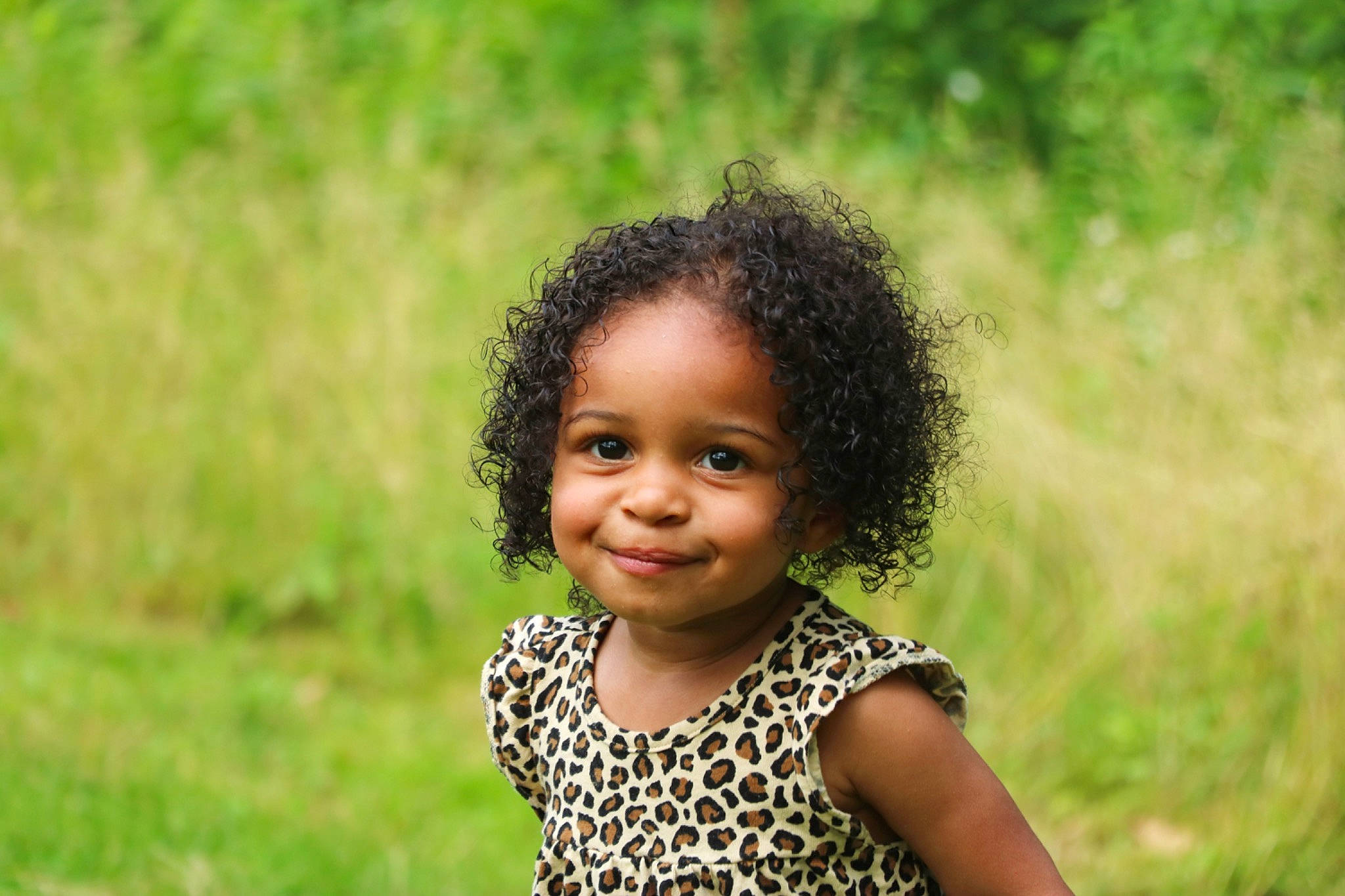 Adayah joined the competition — help win amazing prizes! baby_toddler_clothing, close_up, eye, face, flash_photography, fun, grass, grass_family, grassland, happy, iris, joy, mammal, meadow, nose, people_in_nature, person, plant, skin, smile