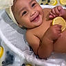 Ayla joined the competition — help win amazing prizes! baby, child, smiling, headband, bow, milk_bath, lemon, blueberry, fruit, water, bathtub, cute, happy, skin, portrait, infant, hand, sitting, playful, fresh