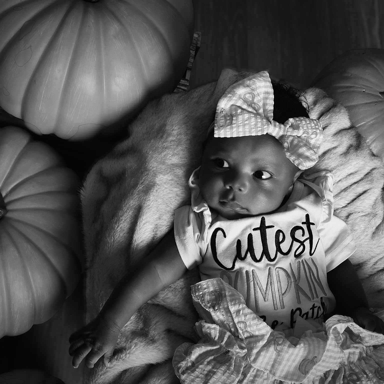 Kendri joined the competition — help win amazing prizes! autumn, baby, black_and_white, blanket, bow, child, clothing, cozy, cute, face, fall, headband, holiday, infant, person, portrait, pumpkin, relaxing, smiling, toddler