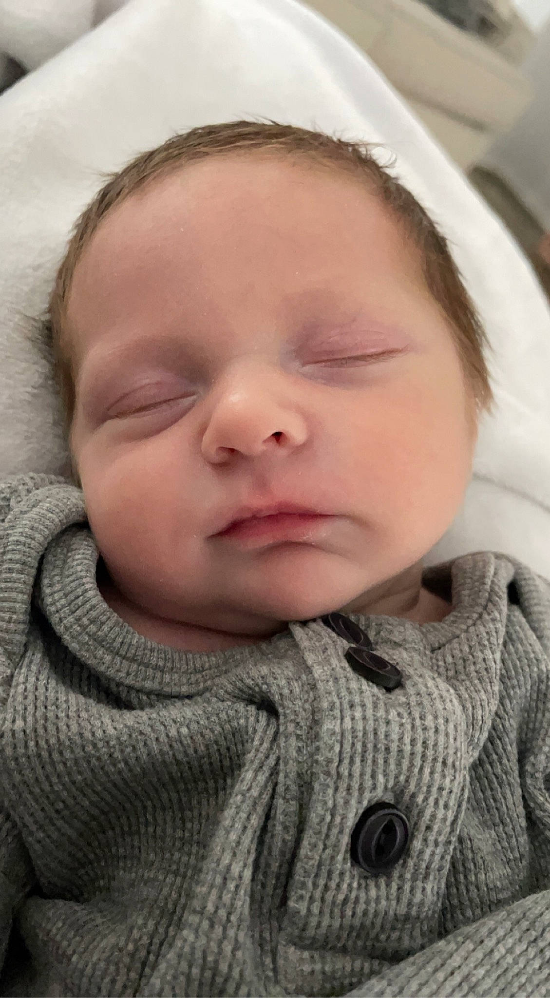 Case joined the competition — help win amazing prizes! baby, cheek, chin, comfort, eye, eyebrow, eyelash, facial_expression, forehead, grey, human, iris, lip, mammal, mouth, nose, person, skin, sleeve, smile