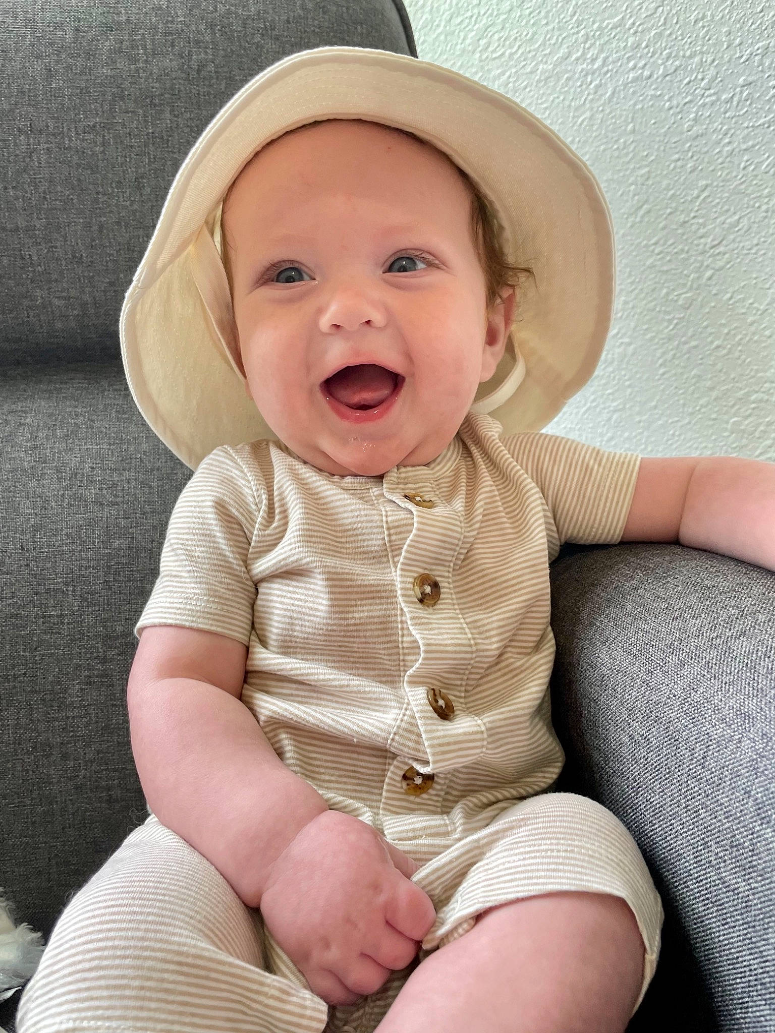 Case is registered to the contest to win money with this photo: baby, baby_toddler_clothing, beauty, cheek, comfort, eye, face, finger, happy, hat, headwear, human_body, iris, lip, person, skin, sleeve, smile, sun_hat, thigh