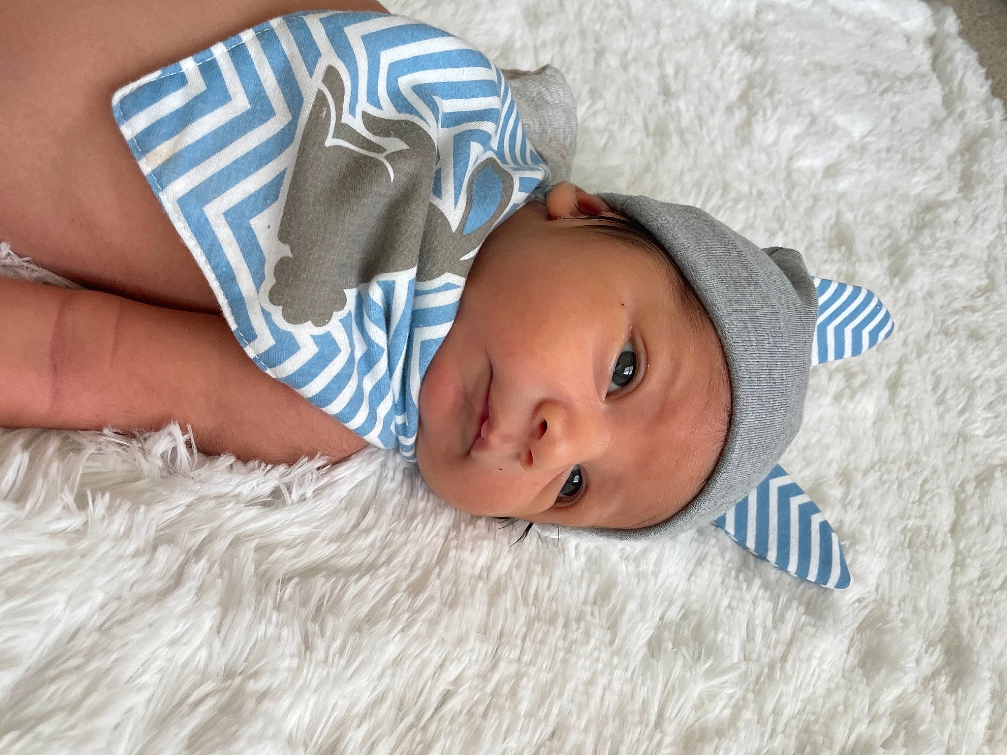 Leónel joined the competition — help win amazing prizes! baby, baby_products, baby_safety, baby_toddler_clothing, bedtime, child, comfort, eye, face, hat, head, headwear, linens, pattern, person, product, room, skin, sleeve, toddler