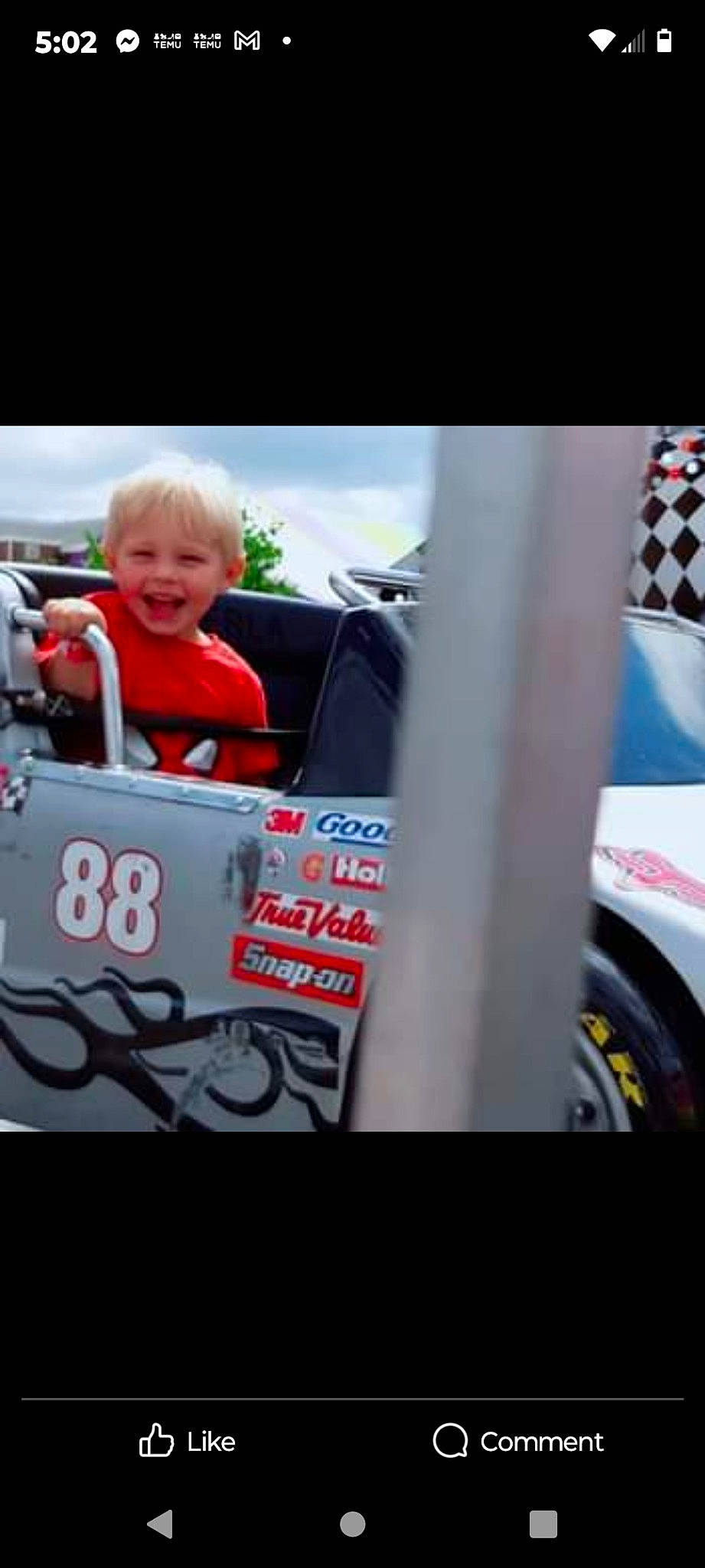 Remington is registered to the contest to win money with this photo: advertising, auto_part, automotive_design, automotive_exterior, automotive_lighting, automotive_tire, automotive_wheel_system, baby, baby_carriage, electric_blue, font, joy, mode_of_transport, motor_vehicle, person, recreation, rim, smile, t_shirt, tire