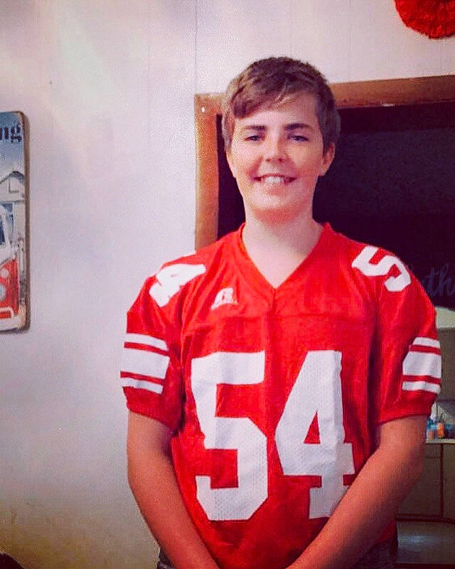 Adyen is registered to the contest to win money with this photo: joy, person, red, sportswear, t_shirt, team, uniform