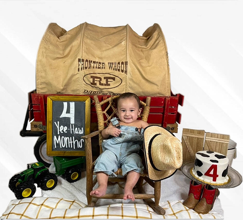 Aj joined the competition — help win amazing prizes! baby, baby_carriage, baby_products, baby_toddler_clothing, child, fashion_accessory, font, joy, mammal, person, product, shorts, sitting, sleeve, smile, t_shirt, tire, toddler, toy, vertebrate