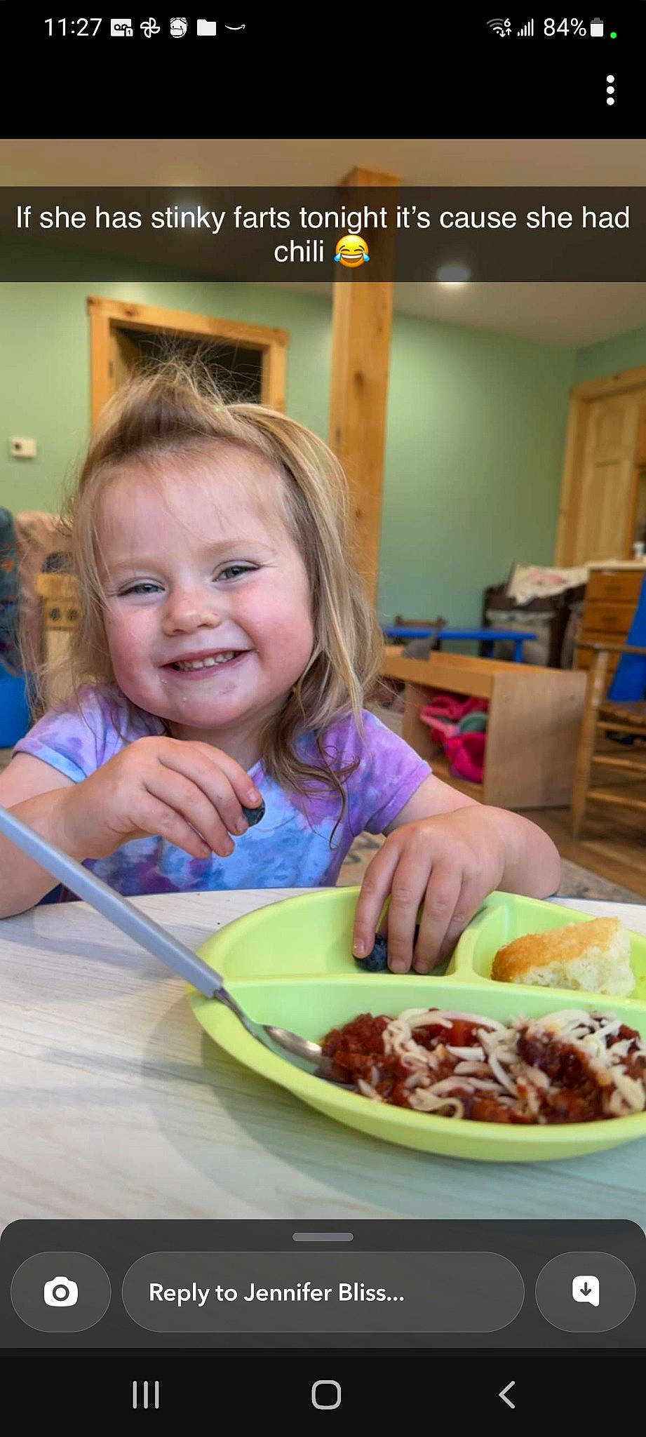 Jurnee is registered to the contest to win money with this photo: bowl, chair, child, comfort_food, cooking, cuisine, dish, food, food_craving, ingredient, joy, junk_food, kitchen_utensil, person, plate, recipe, sharing, smile, spoon, table