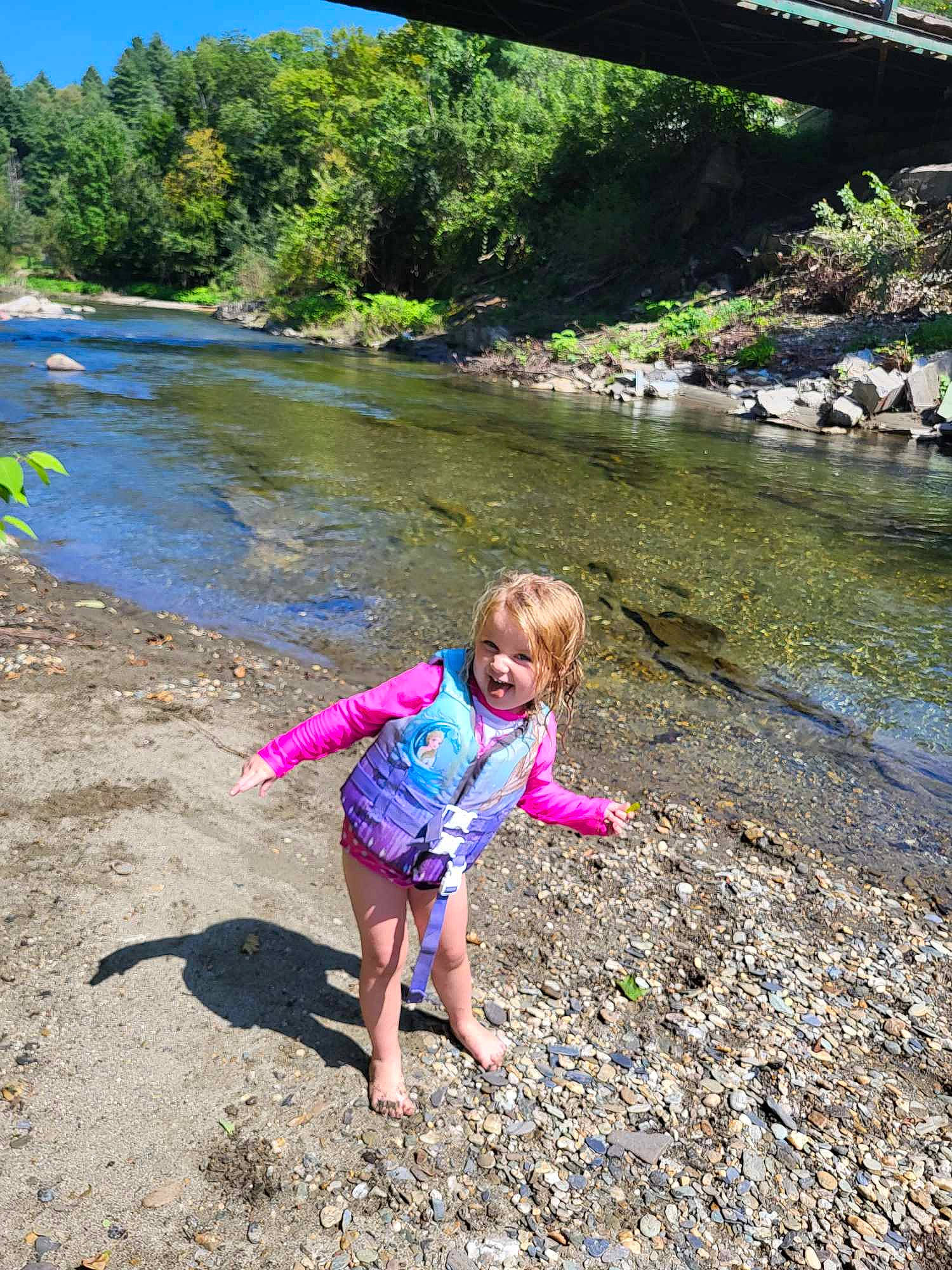 Jurnee joined the competition — help win amazing prizes! bank, botany, fluvial_landforms_of_streams, forest, fun, grass, lake, landscape, leaf, leisure, natural_environment, nature, people_in_nature, person, plant, recreation, sky, toddler, tree, water