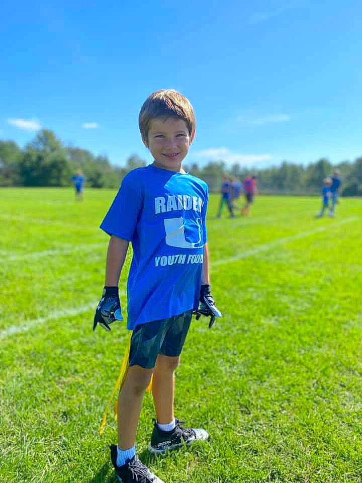 Gracen joined the competition — help win amazing prizes! cloud, electric_blue, grass, grass_family, grassland, happy, joy, landscape, leisure, meadow, people_in_nature, person, plain, plant, player, recreation, shorts, sky, sports, sports_equipment