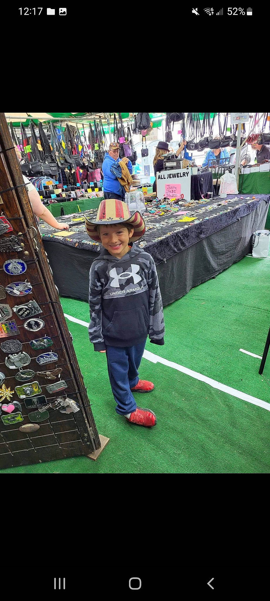 Gracen joined the competition — help win amazing prizes! baseball_cap, boot, cap, competition_event, event, fan, fashion_accessory, flooring, fun, games, grass, hat, headwear, joy, leisure, person, recreation, retail, shelf, stadium