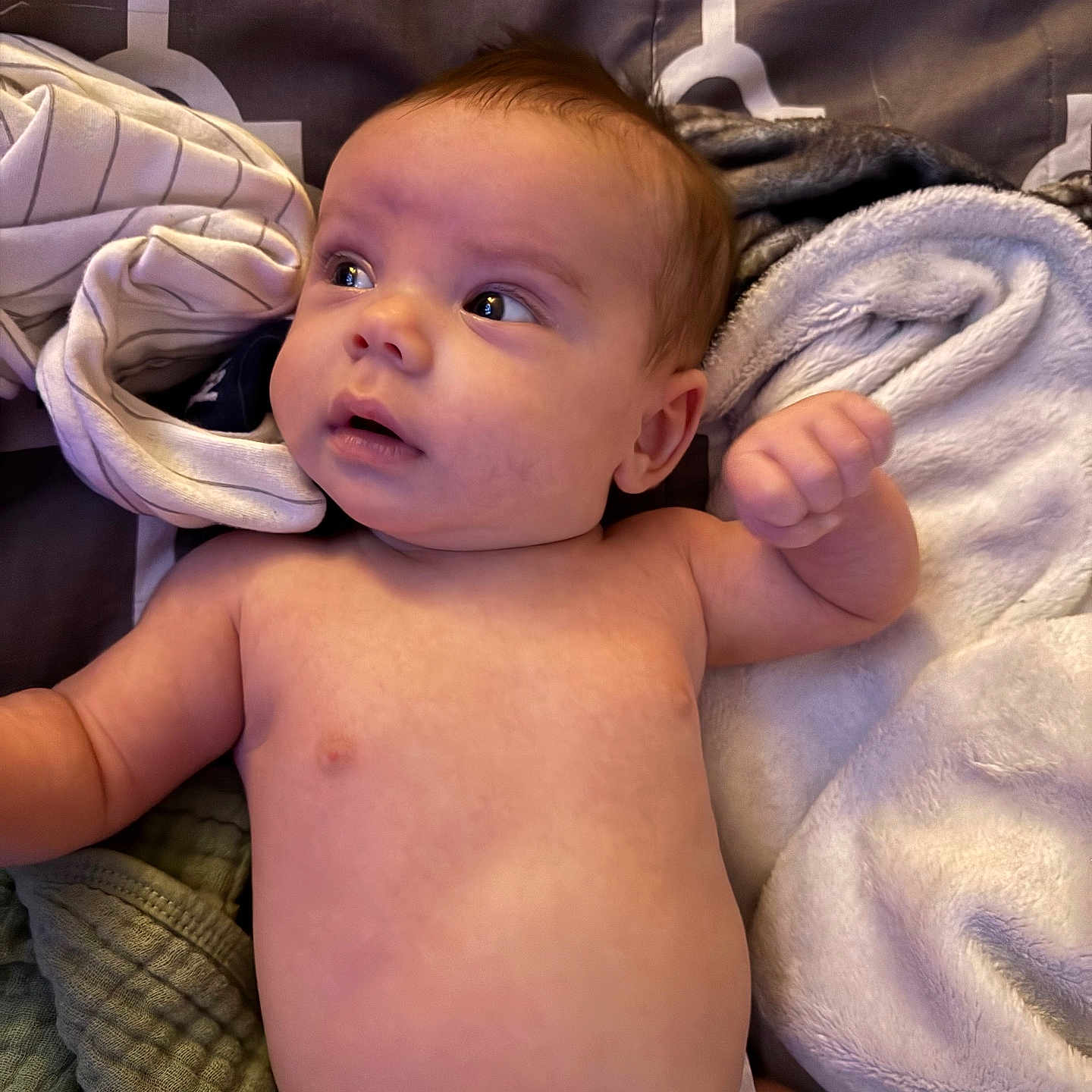 Easton joined the competition — help win amazing prizes! baby, bed, blanket, child, comfort, cozy, curious, cute, diaper, expression, eyes, face, fist, hand, indoors, infant, lying_down, newborn, skin, soft