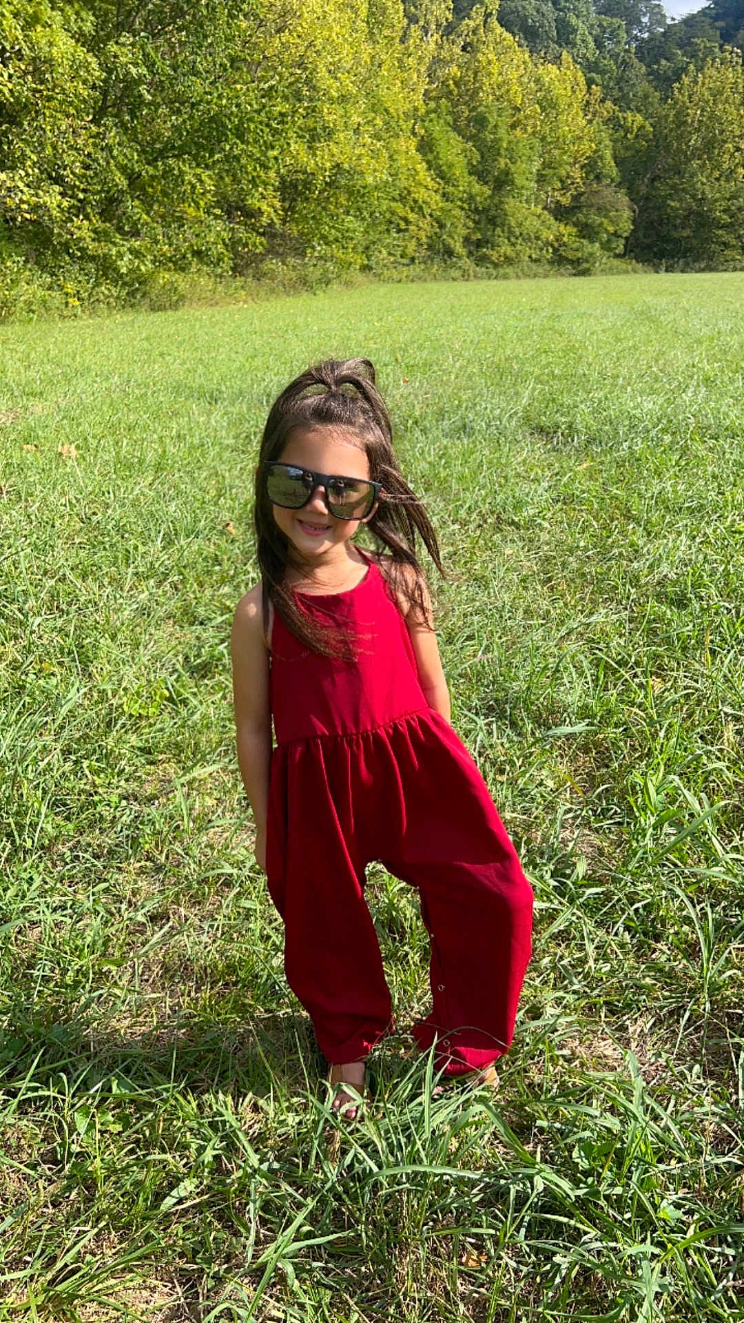 Nevaeh is registered to the contest to win money with this photo: accessories, child, face, female, field, girl, glasses, grass, grassland, head, nature, outdoors, park, person, photography, plant, portrait, sunglasses, tree, vegetation