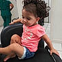 Nevaeh is registered to the contest to win money with this photo: baby, bodypart, chair, clothing, cushion, door, face, furniture, hair, head, homedecor, mouth, pants, person, photography, portrait, shorts, sitting, t_shirt, teeth