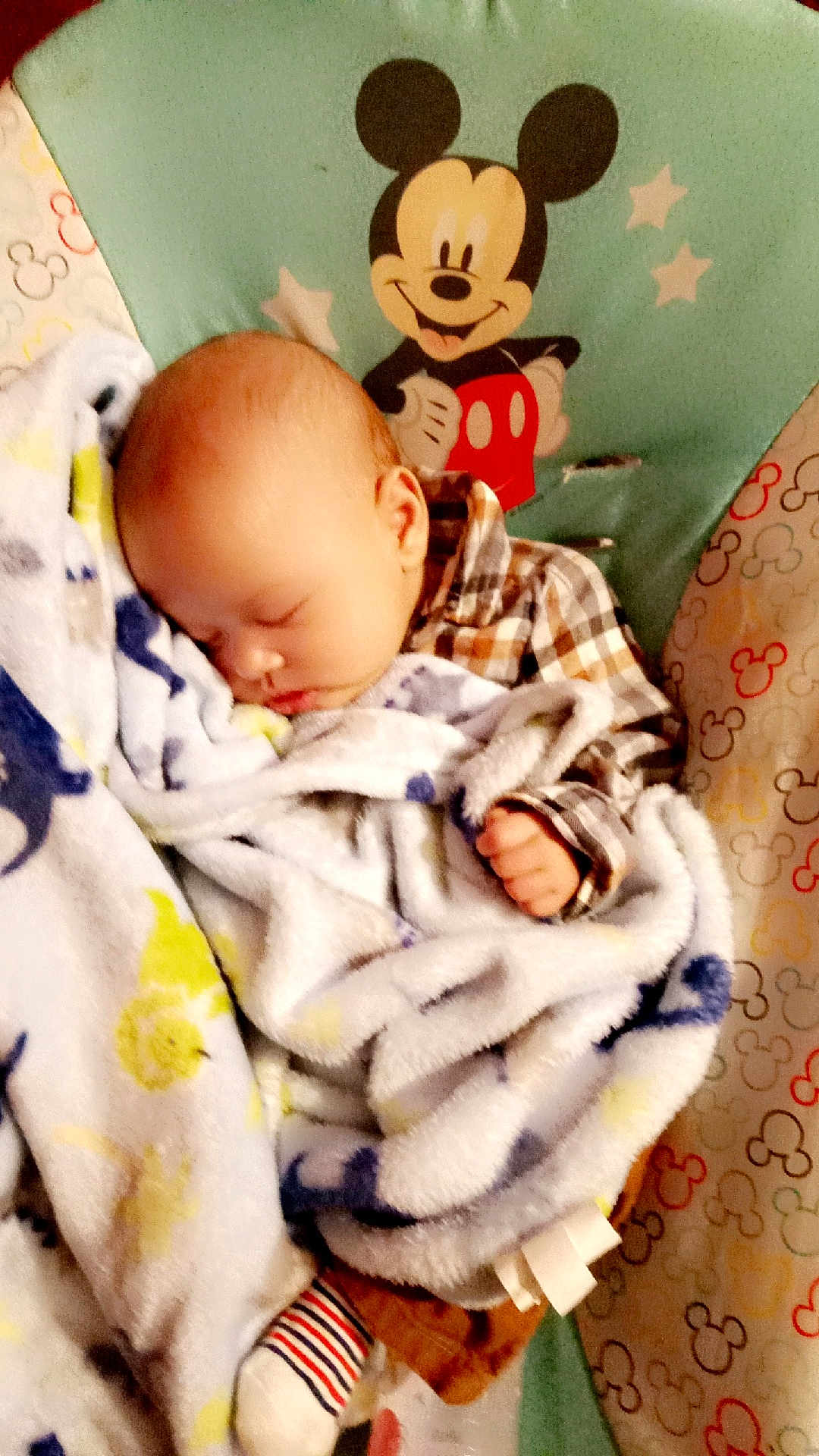 Hunter joined the competition — help win amazing prizes! baby, blanket, sleeping, mickey_mouse, plaid_shirt, child, soft_toy_pattern, cozy, infant, cute, nap, striped_sock, peaceful, toddler, comfort, bedtime, patterned_fabric, cartoon_character, rest, indoor