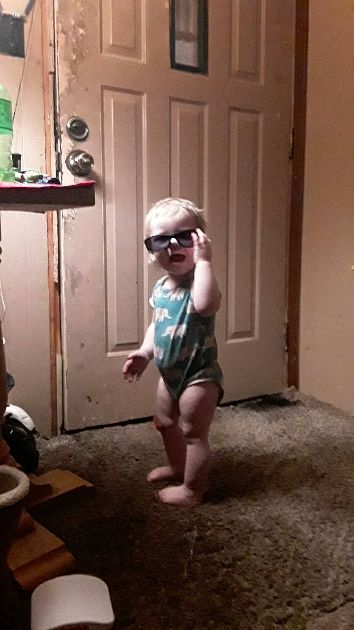Amantha Annalynn joined the competition — help win amazing prizes! child, door, eyewear, floor, flooring, fun, goggles, happy, human_leg, joint, knee, person, shoulder, sunglasses, thigh, thumb, toddler, trunk, vision_care, waist