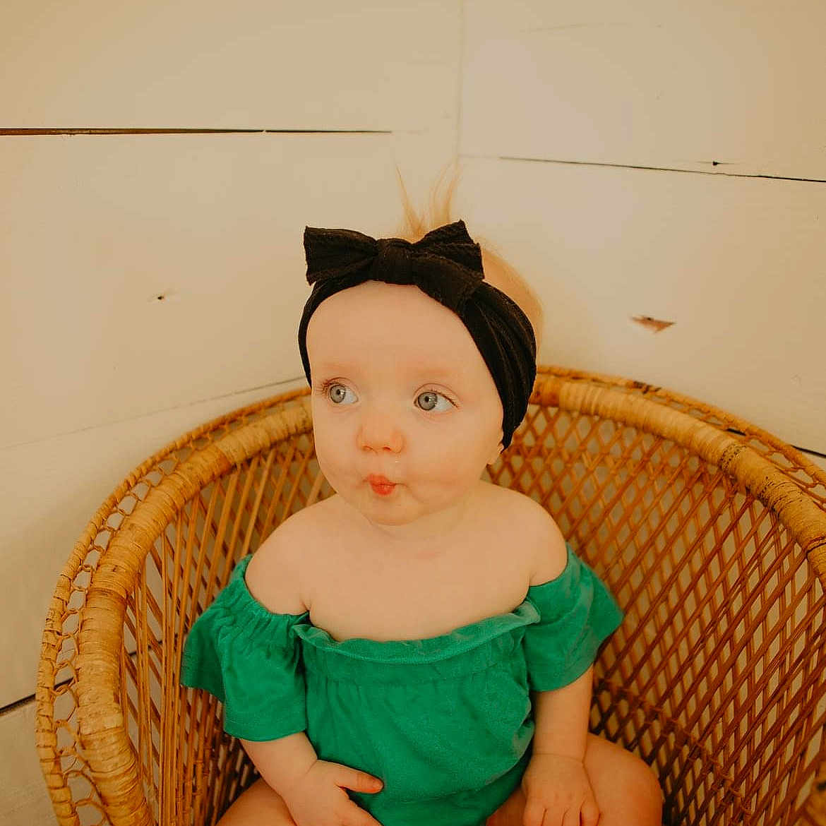 Kayla is registered to the contest to win money with this photo: baby_toddler_clothing, costume, costume_hat, doll, eye, fashion_accessory, hair_accessory, happy, headpiece, human_body, human_leg, jewellery, neck, pattern, peach, room, sitting, thigh, toy, vintage_clothing
