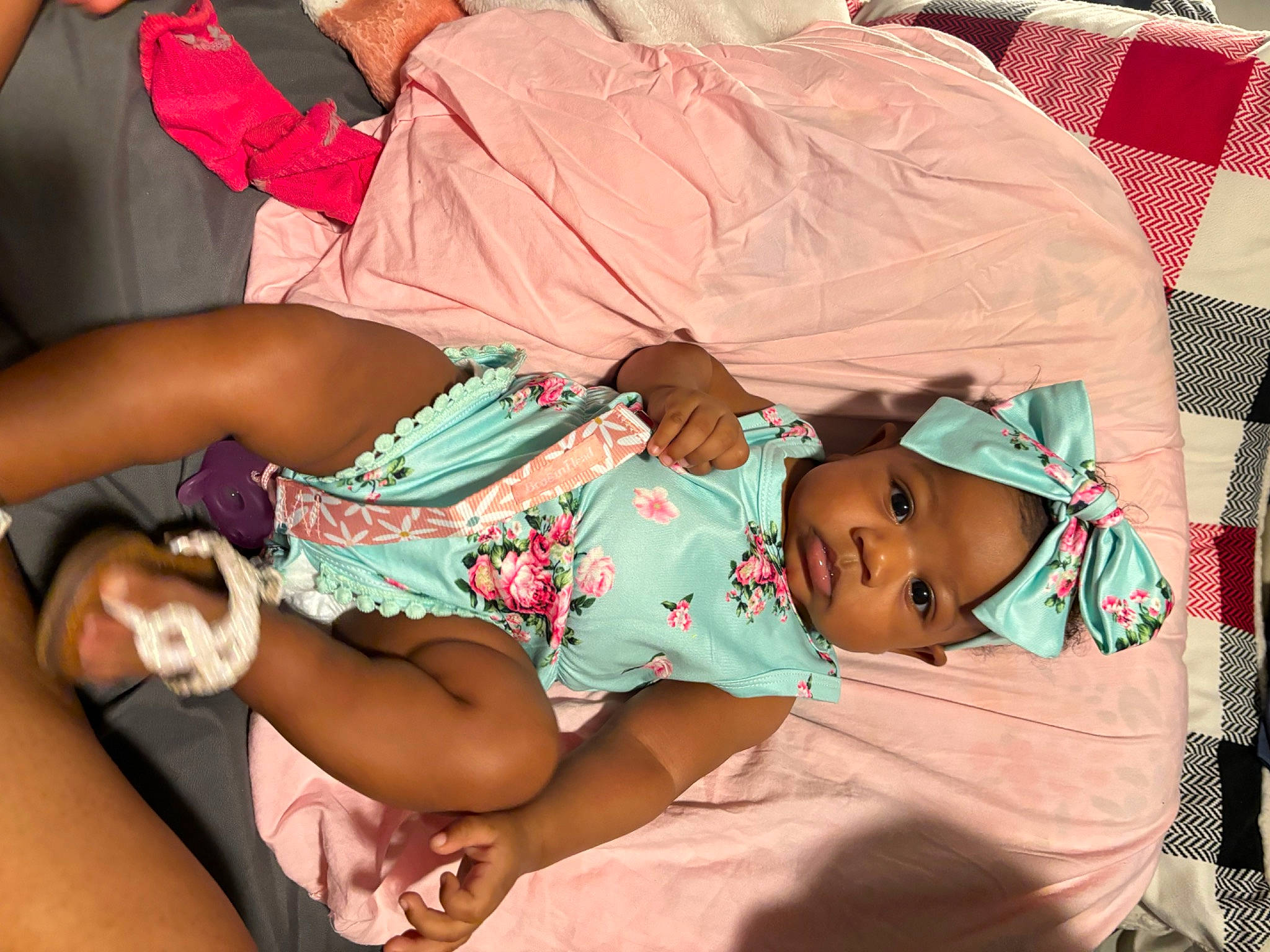 Kimora joined the competition — help win amazing prizes! baby_toddler_clothing, child, comfort, elbow, facial_expression, headwear, human_body, human_leg, joint, knee, lap, leg, mouth, nail, person, pink, shorts, skin, textile, thigh