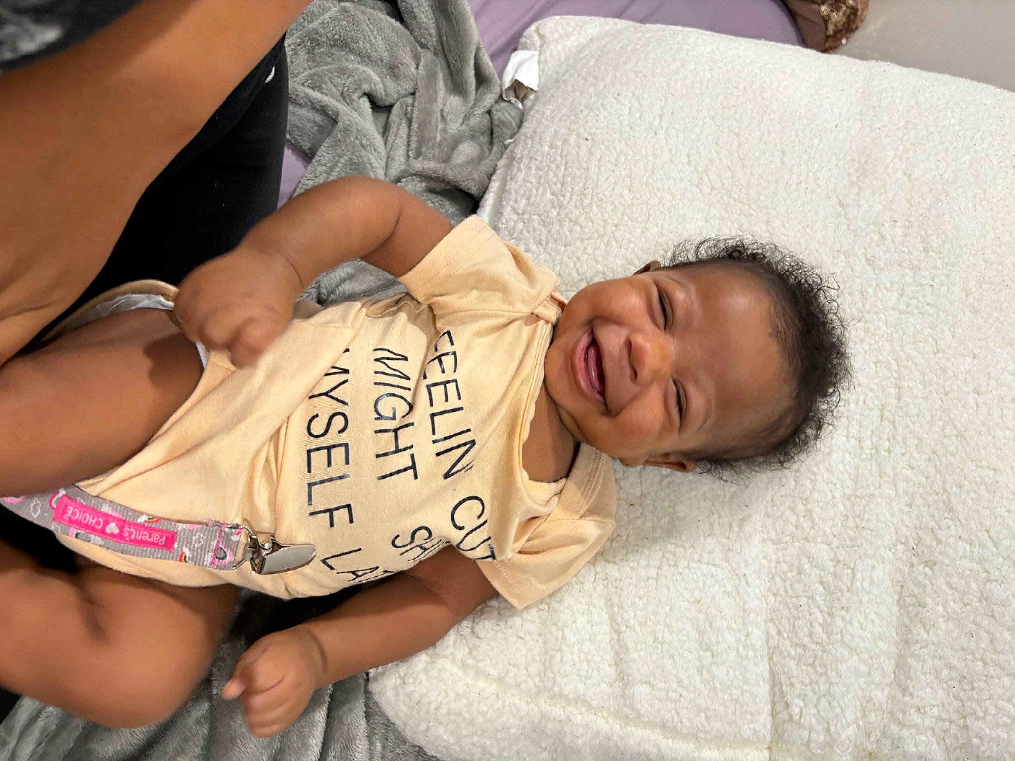 Kimora is registered to the contest to win money with this photo: abdomen, baby, baby_toddler_clothing, cheek, chest, child, comfort, elbow, glasses, hand, human_body, human_leg, joy, knee, mammal, mouth, person, skin, stomach, thigh