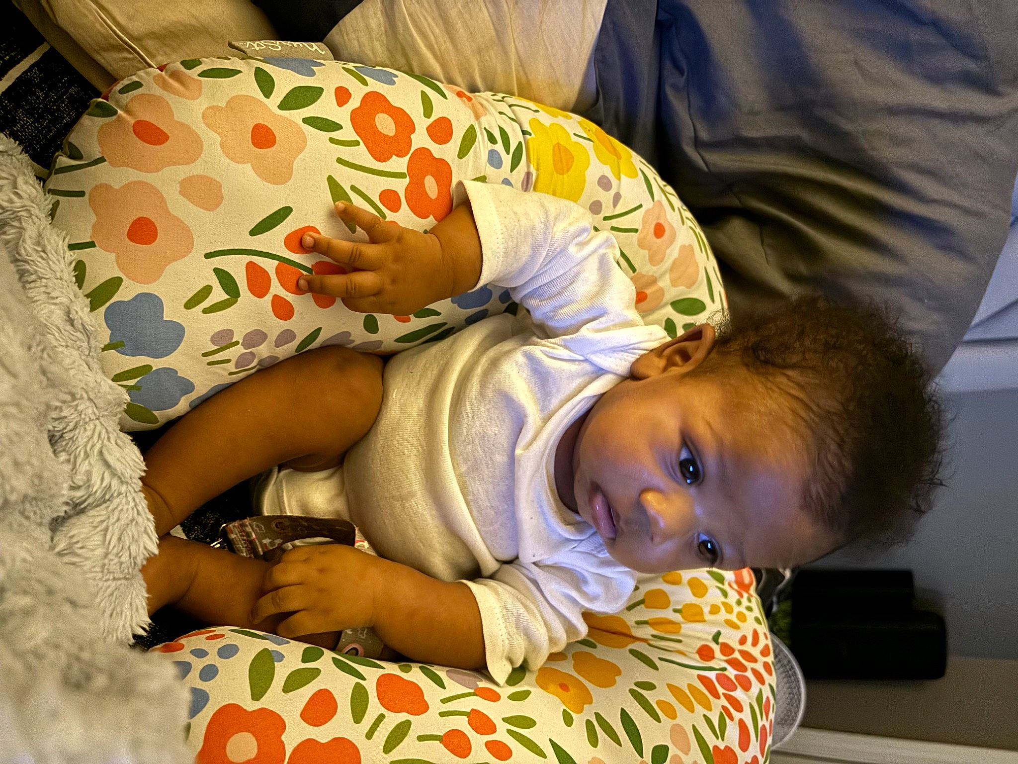 Kimora is registered to the contest to win money with this photo: baby, baby_products, baby_toddler_clothing, bedtime, child, comfort, elbow, fun, happy, human_body, linens, nap, person, room, sitting, sleep, toddler