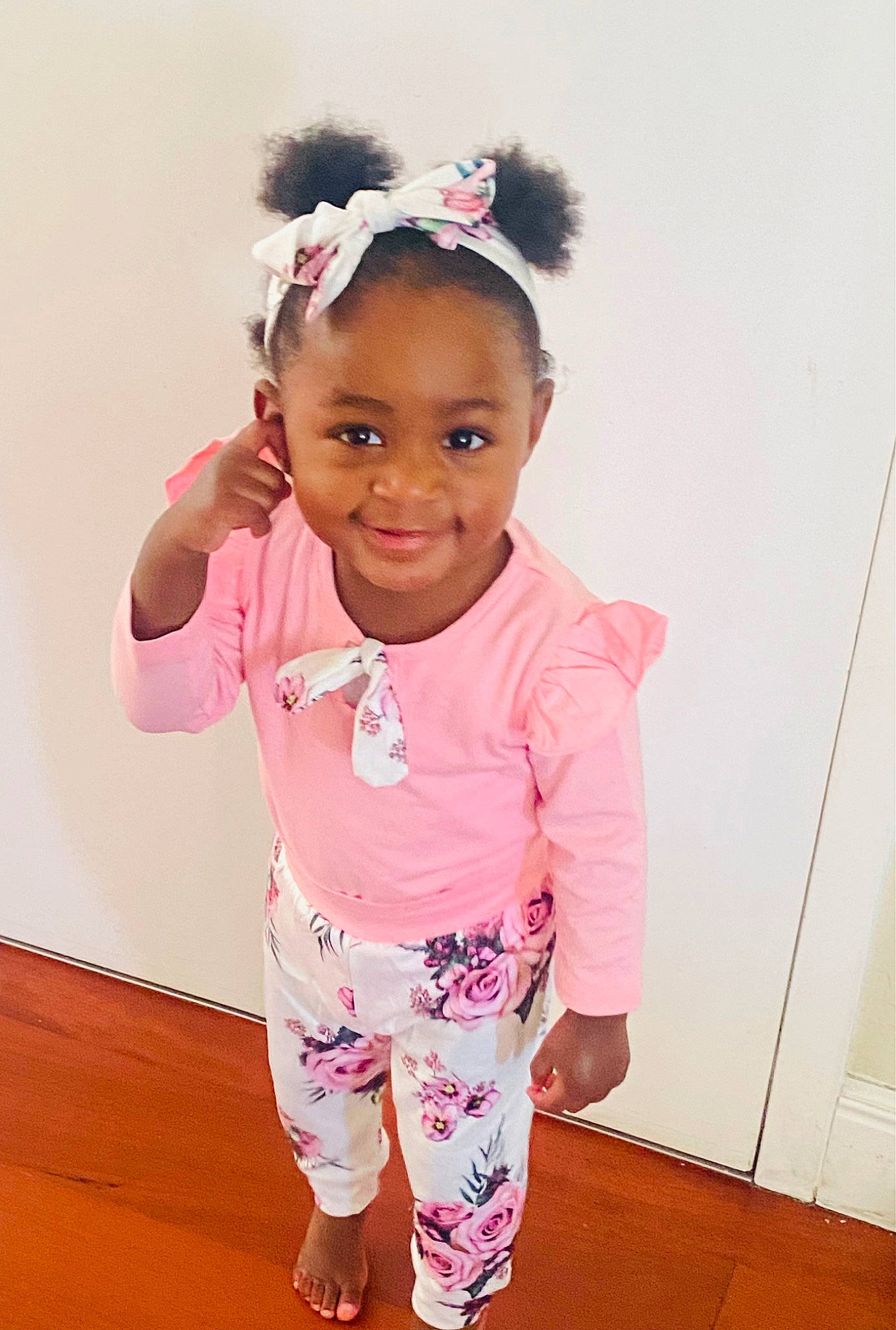 Ava is registered to the contest to win money with this photo: active_pants, baby_toddler_clothing, cheek, child, costume, embellishment, eyewear, fashion_accessory, flooring, hair_accessory, happy, headband, headpiece, jewellery, joy, magenta, pattern, person, pink, sleeve