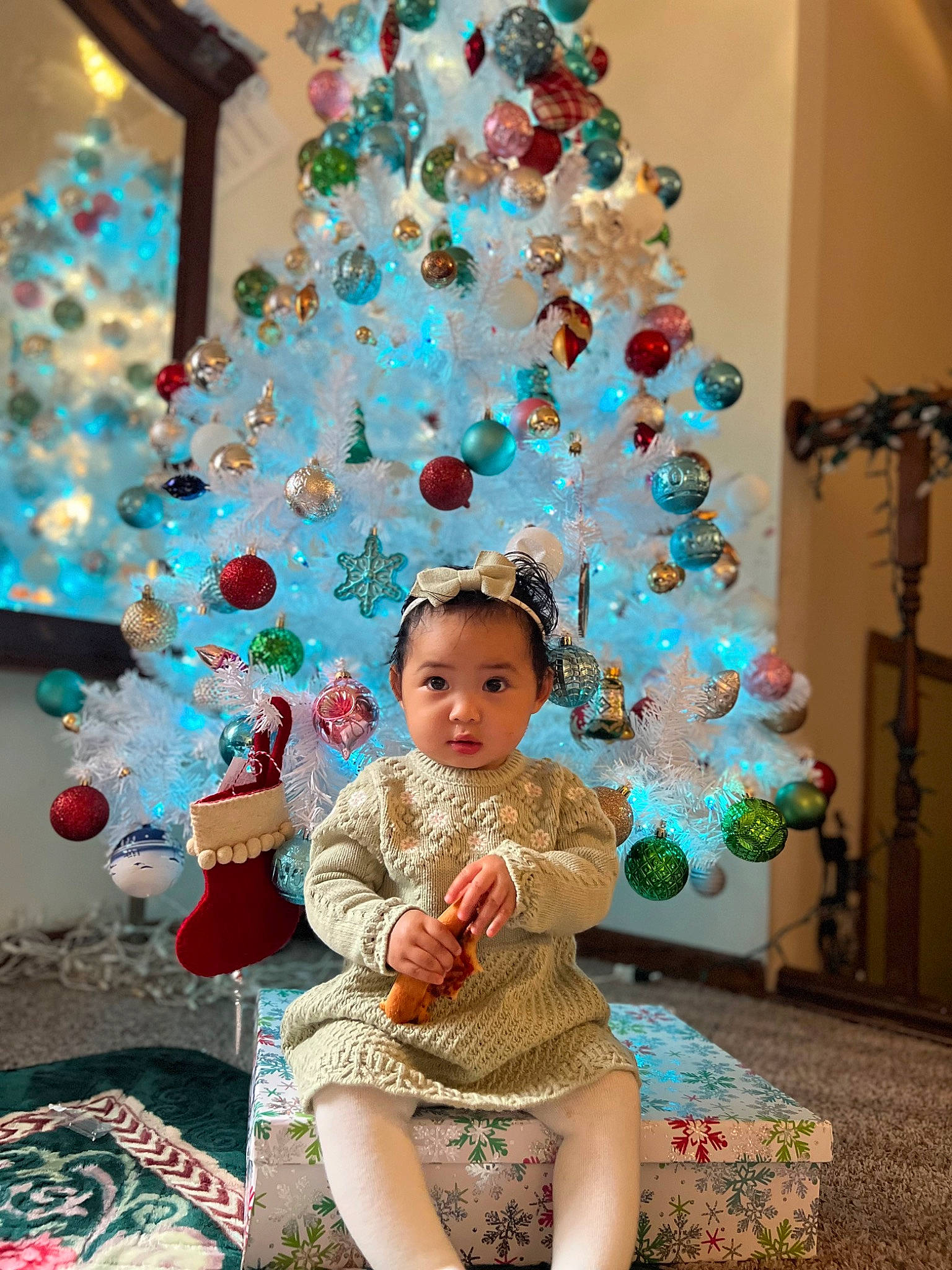 Dorothy joined the competition — help win amazing prizes! baby_toddler_clothing, child, christmas, christmas_decoration, christmas_eve, christmas_ornament, christmas_tree, conifer, event, evergreen, fun, happy, holiday, holiday_ornament, lap, ornament, party_supply, person, room, toddler