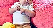 Charika joined the competition — help win amazing prizes! baby, infant, plush_toy, duck, pink_cushion, white_shirt, patterned_pants, child, soft_toy, cute, indoors, relaxed, seated, toddler, furniture, cozy, portrait, small_child, toy, comfort