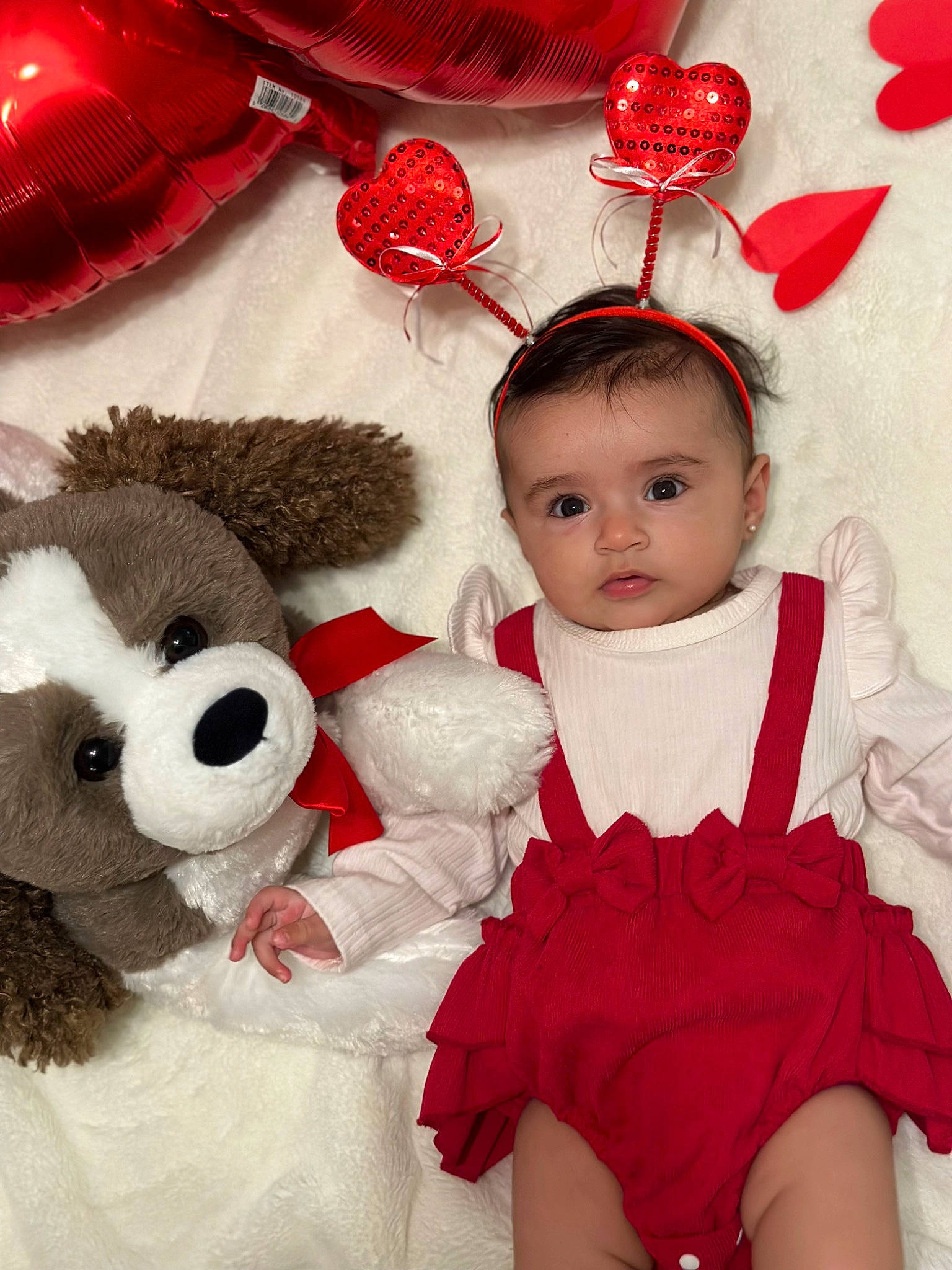 Danna is registered to the contest to win money with this photo: baby_toddler_clothing, child, costume_hat, dress, event, face, happy, headgear, headpiece, organ, pattern, people, person, pink, product, red, stuffed_toy, textile, toddler, toy